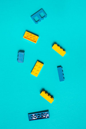 Constructor children plastic multi-colored on a pastel blueの写真素材