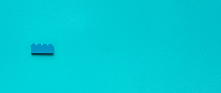 Constructor childrens plastic on a pastel blue
