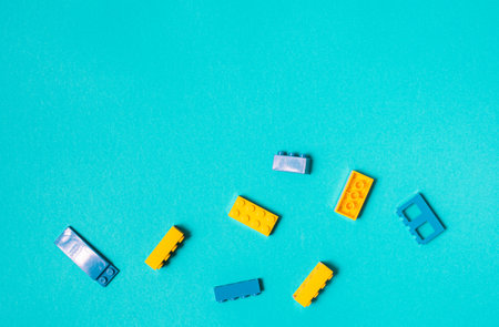 Constructor children plastic multi-colored on a pastel blueの写真素材