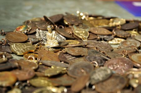 Many Small Buddha Coin Monkの写真素材