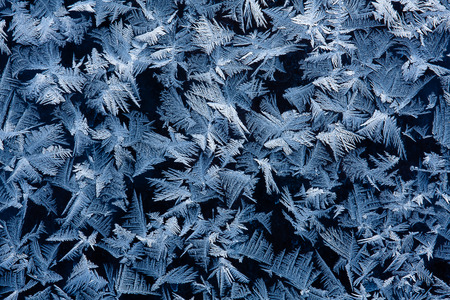 Frosty natural pattern on winter window