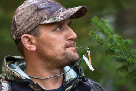 hunter with a grouse callの写真素材