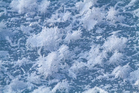 ice crystals grew on the surface river ice in the bitter coldの写真素材