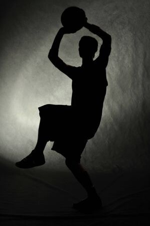 Basketball player with ballの写真素材