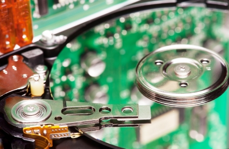 Blurred image of the chip mirrored on the surface of a hard disk