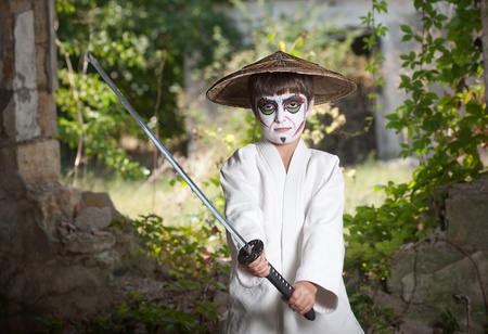 Young fantastic warrior in fighting positionの写真素材