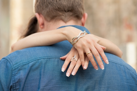 Woman embracing the man s neckの写真素材