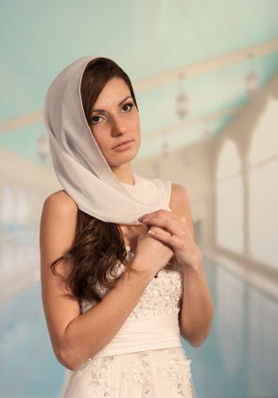 Beautiful young woman in wedding gown, Arabic style portraitの写真素材