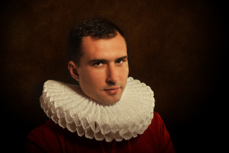 Medieval style portrait of a man in ruff collarの写真素材