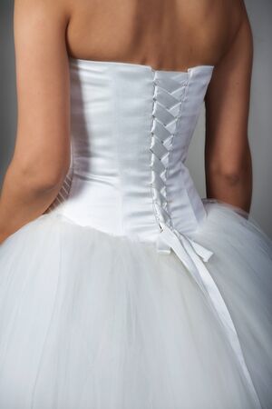 Closeup shot of a bridal gown with corset, back viewの写真素材