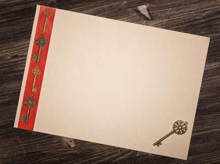 Old decorative keys and paper blankの写真素材