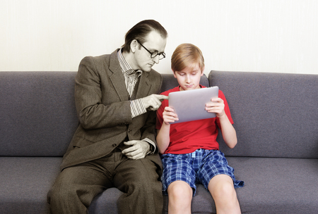 Technology gap in different generations conceptの写真素材