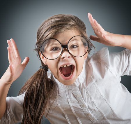 Funny crazy girl, studio shotの写真素材