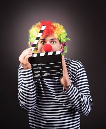 Funny clown with clipper box.の写真素材