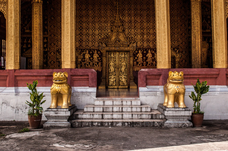 Golden door of a temple Luang Prabang Laosの写真素材
