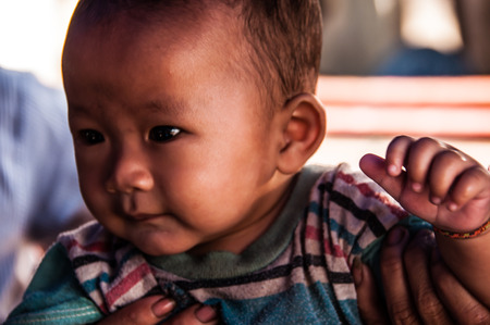 Lao child in Pakse Pakse Laosのeditorial素材