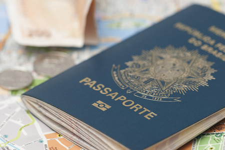 A passport is a government-issued document that certifies the identity and nationality of its holder for the purpose of international travel の写真素材
