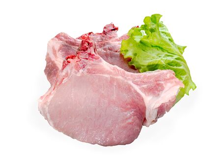 fresh pork meat with lettuce leaves isolated on white backgroundの写真素材