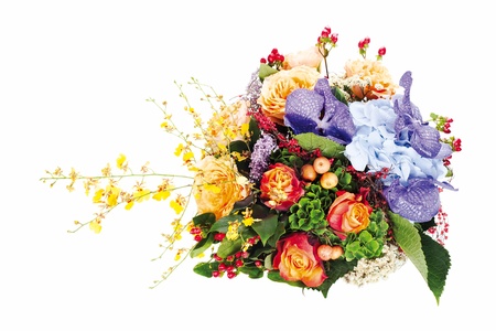 colorful floral  bouquet of roses, lilies, freesia, orchids and irises isolated on white backgroundの写真素材