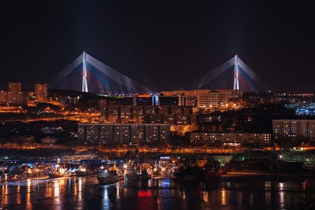 night view of the longest cable-stayed bridge in the world in the Russian Vladivostok over the Eastern Bosphorus strait to the Russky Islandの写真素材