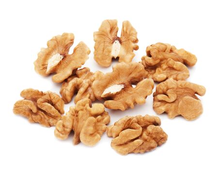 Heap of fresh shelled walnuts on white background  Close-up の写真素材