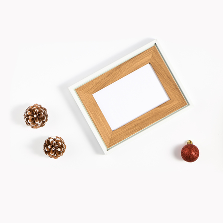 Festive composition of Christmas decorations on white background. Flat lay with copy space. New year holiday frame.の写真素材