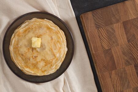 A stack of pancakes on the plate for Maslenitsa. Holiday breakfast.の写真素材