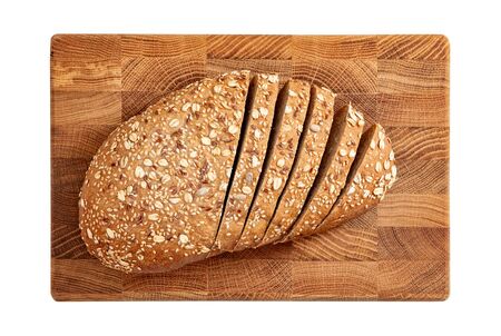 Isolated sliced bread on wooden cutten board on white background top view.