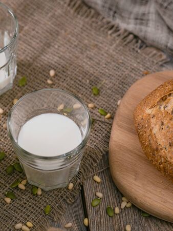 Breakfast in the country with milk and whole wheat bread.の写真素材