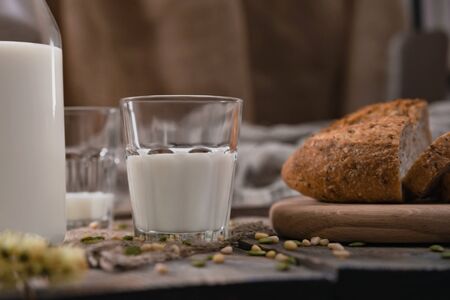 Breakfast in the country with milk and whole wheat bread.の写真素材