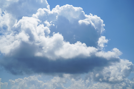 Blue sky with clouds backgroundの写真素材