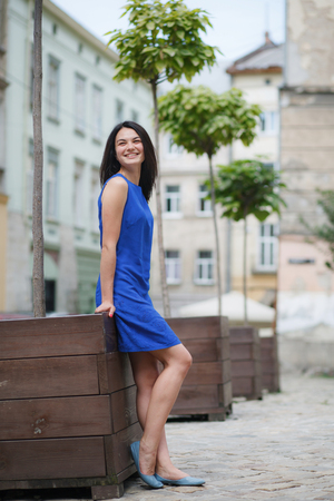 Portrait of a happy woman in the cityの写真素材