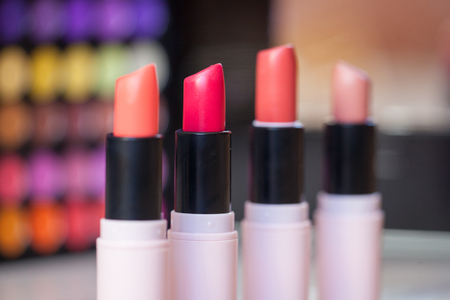 Close up photo of beautiful lipstick shades. Assortment of lipsticksの写真素材