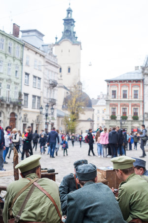 Lviv, Ukraine - November 2, 2018: 100th anniversary of West Ukrainian People's Republic. ZUNR. Reconstruction of the position of Ukrainian soldiers from checkpoints, barriers, artillery, armored cars and field kitchenのeditorial素材