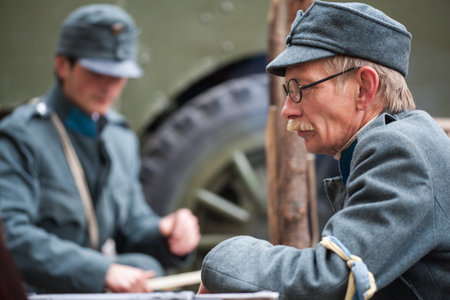 Lviv, Ukraine - November 2, 2018: 100th anniversary of West Ukrainian People's Republic. ZUNR. Reconstruction of the position of Ukrainian soldiers from checkpoints, barriers, artillery, armored cars and field kitchenのeditorial素材