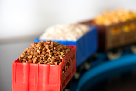 Wagons with grain of buckwheat, rice and peas. Grain Cultures.の写真素材