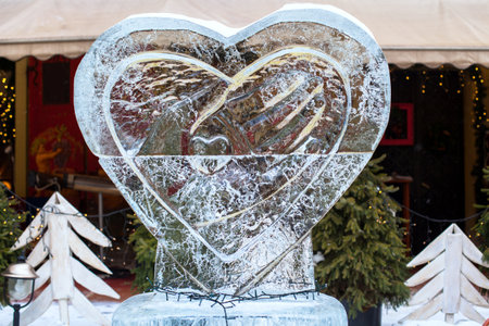 LVIV, UKRAINE - February 21, 2018. Ice sculpture with a heart.のeditorial素材