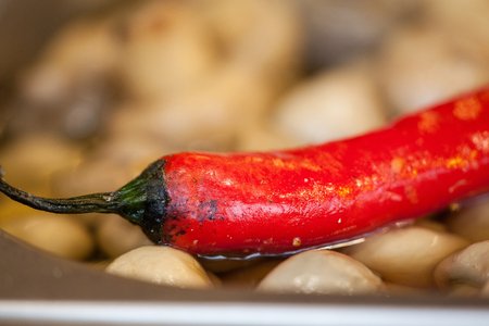 Chili pepper and mushrooms on the grill close up. Fine Food Fair. Selective focusの写真素材