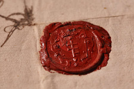 An old letter with a red wax seal. Fragment Of The Real Ancient Manuscript 1800's. Red Seal.の写真素材