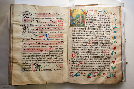 LVIV, UKRAINE - April 4, 2020: manuscripts in the medieval library. Incunabula. Books printing in Europe in the 1450s to the end of the 15th centuryのeditorial素材