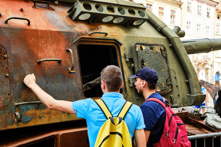 LVIV, UKRAINE - August 18, 2022: Exhibition of destroyed Russian military vehicles during the Russian-Ukrainian war. Ukrainians show great interest in destroyed Russian military vehicles exhibition in Lviv.のeditorial素材