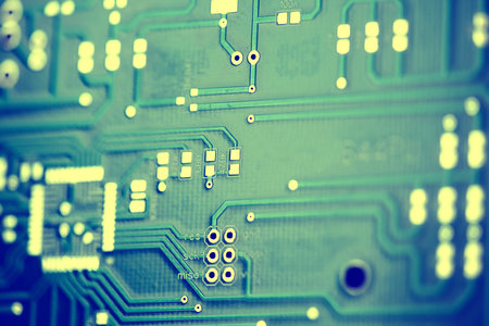 Macro shot of the back side of a circuit board. Close up of the blue circuit board. circuit board backgroundの写真素材