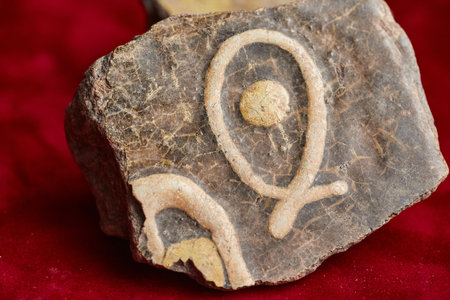 Enamelled tile from church with a stylized fish image. The fish, a symbol of Christの写真素材