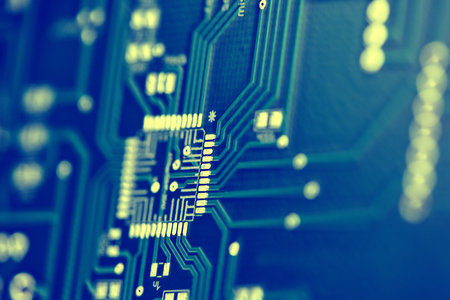 Macro shot of the back side of a circuit board. Close up of the blue circuit board. circuit board backgroundの写真素材
