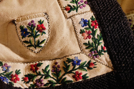 Fragment Ancient Hutsul keptar with embroidery. Short sleeveless fur coat. Clothing is made of sheep leather.の写真素材