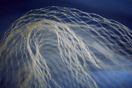 Abstract tunnel effect with yellow nylon mesh on dark blue background. Curved synthetic fiber...