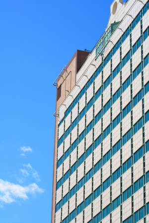 Office building on blue sky