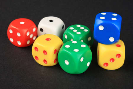 Seven dices on black