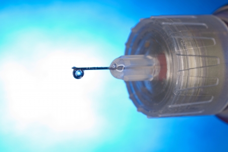 Extreme macro of a drop of insulin on a hypodermic needleの写真素材
