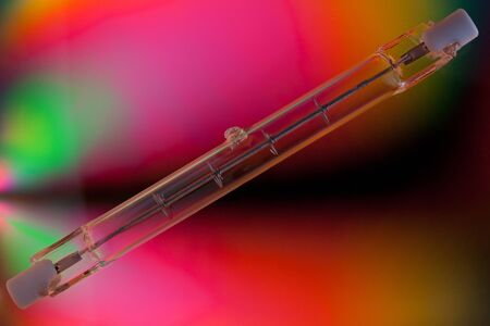 Close up of a halogen light bulb on a polarised backgroundの写真素材